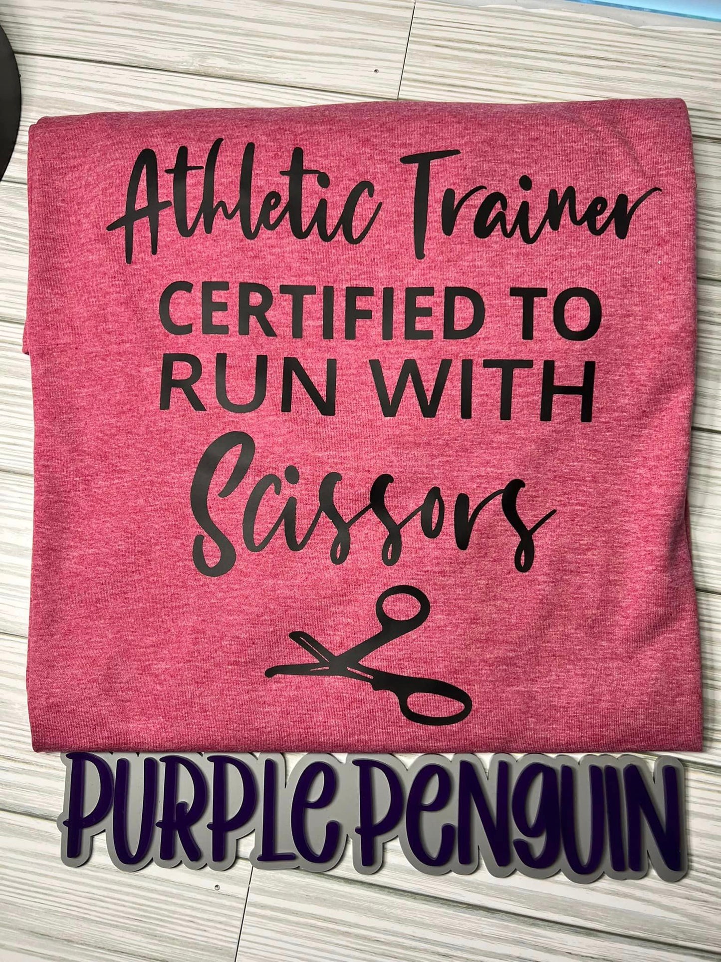 Athletic Trainer with Scissors